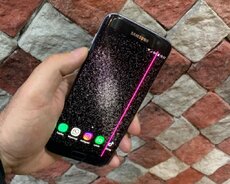 Samsung S7 edge tək telefon özüdü 32GB 4RAM zaryatka yaxşi saxliyir ekranind